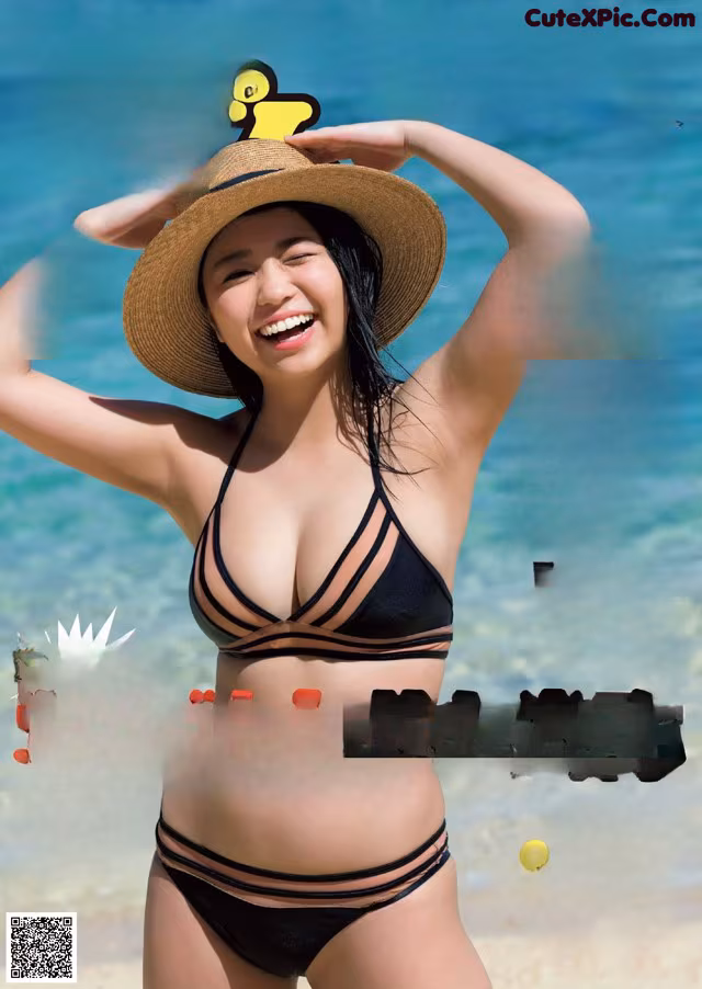 A woman in a bikini and hat on the cover of a magazine.